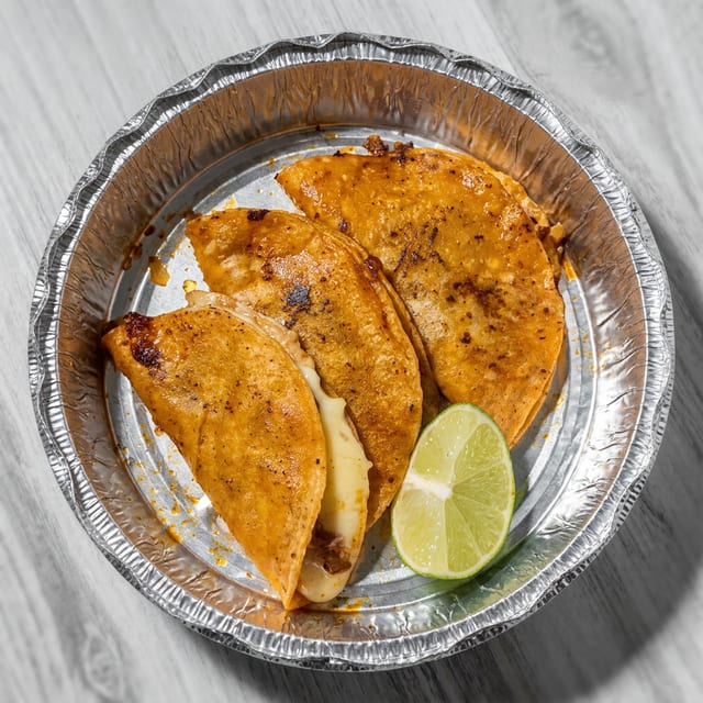 Quesabirrias (Cheese Birria Tacos).